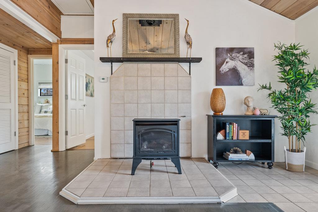 98 Paddon Road Watsonville, CA 95076 - Photo 6 of 28 a living room with furniture and a fireplace