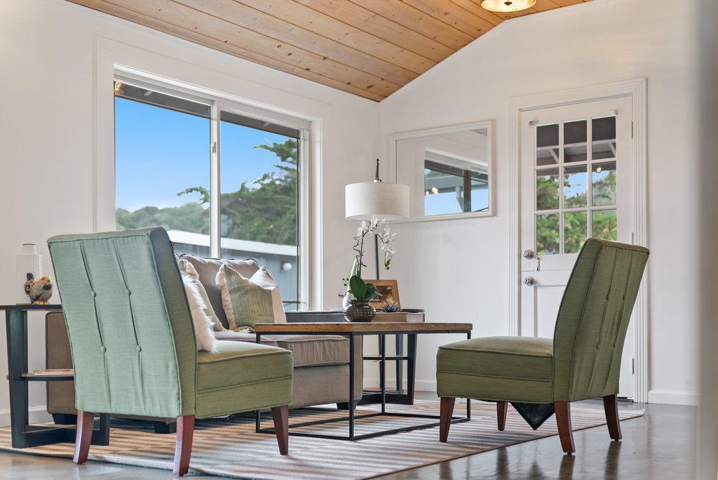 98 Paddon Road Watsonville, CA 95076 - Photo 8 of 28 a view of a workspace with furniture and a window