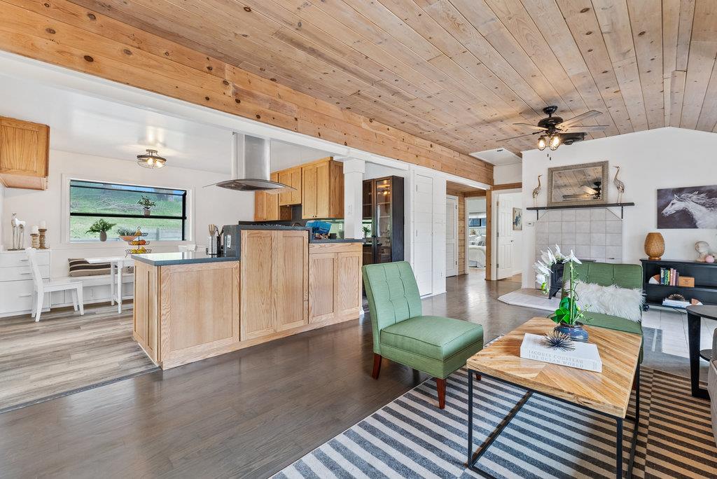 98 Paddon Road Watsonville, CA 95076 - Photo 10 of 28 a living room with furniture and a kitchen view