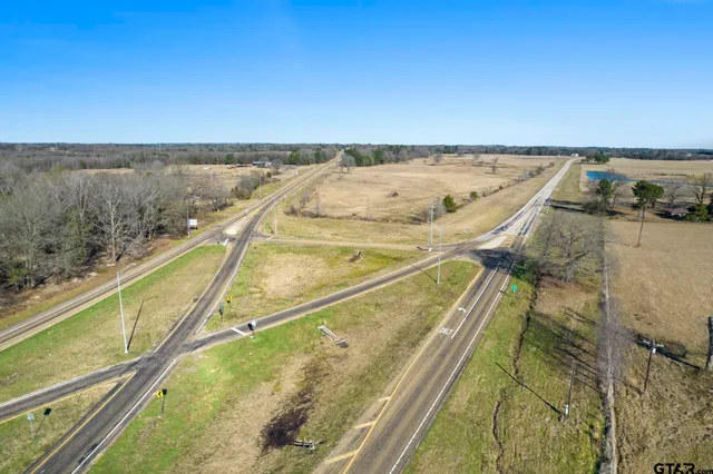 a view of a swimming pool and an outdoor seating