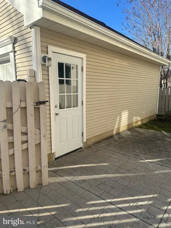 a view of a house with a street