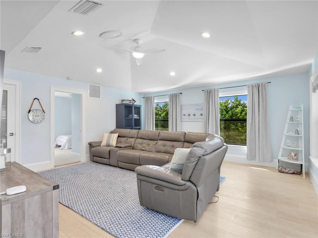 188 Columbus Way Marco Island, FL 34145 - Photo 11 of 38 Living area featuring light wood-style floors, recessed lighting, and a ceiling fan