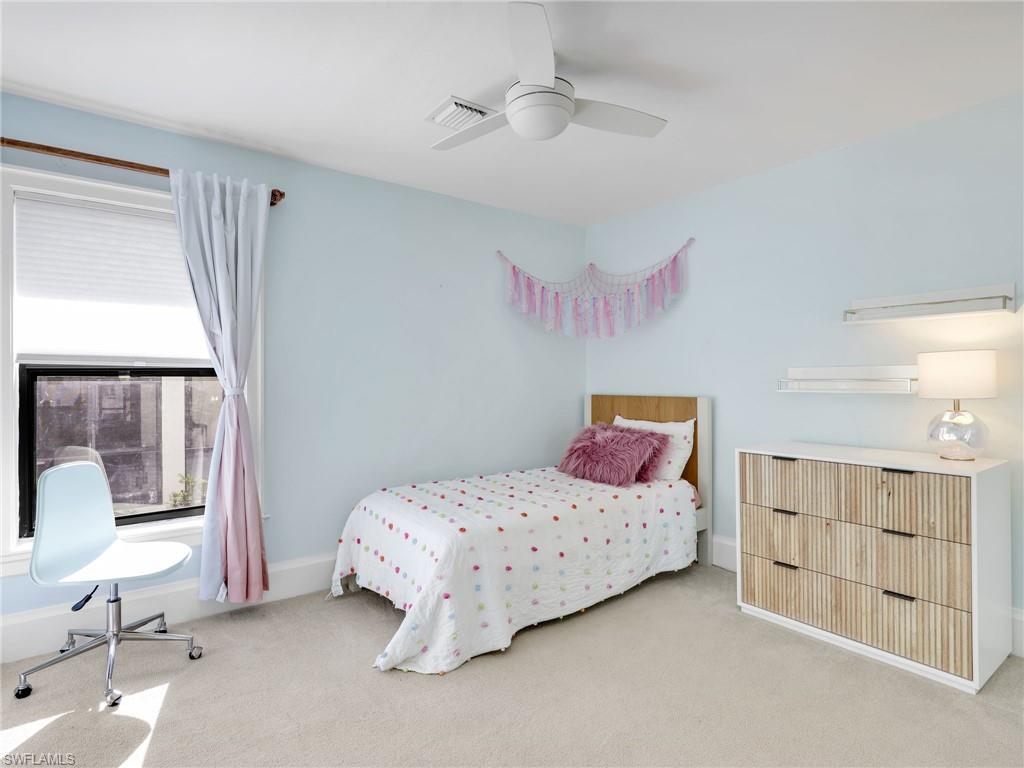 188 Columbus Way Marco Island, FL 34145 - Photo 17 of 38 Carpeted bedroom featuring a ceiling fan and baseboards