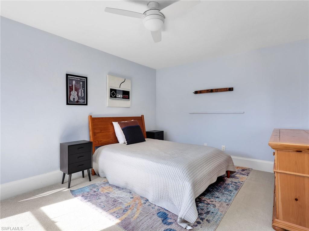 188 Columbus Way Marco Island, FL 34145 - Photo 20 of 38 Bedroom featuring carpet and a ceiling fan