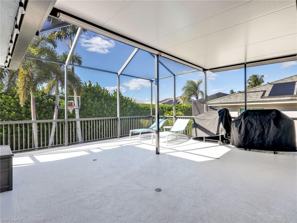 188 Columbus Way Marco Island, FL 34145 - Photo 25 of 38 Sunroom / solarium featuring a patio