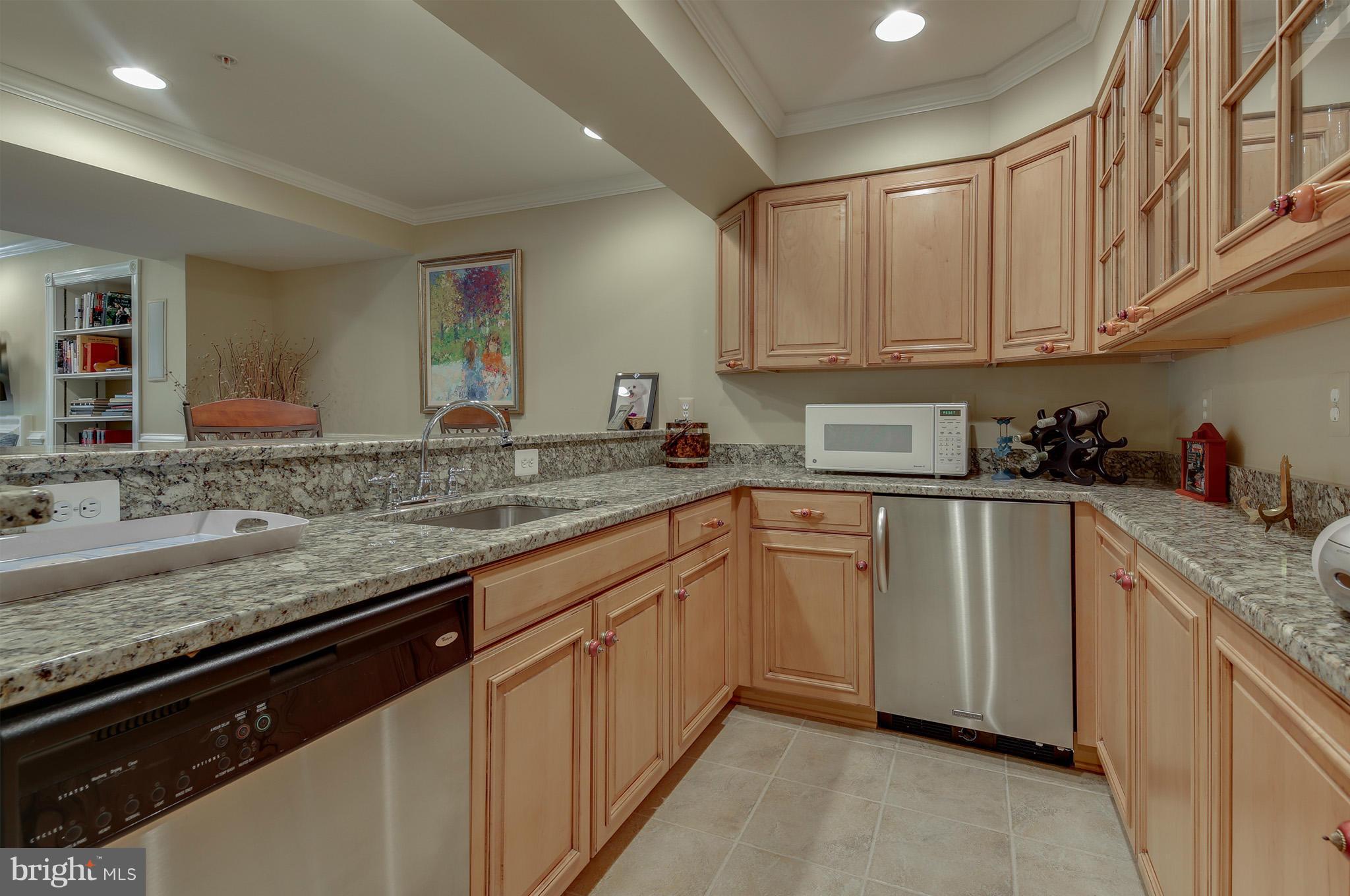 8321 Meadowsweet Road Pikesville, MD 21208 - Photo 22 of 30 Granite counters and SS dishwasher/refrigerator