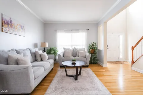 a view of a living room and entry way