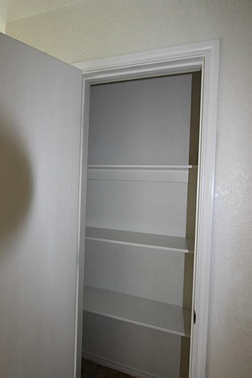 5015 Fox Mill Lane Spring, TX 77389 - Photo 8 of 9 a view of an empty walk in closet