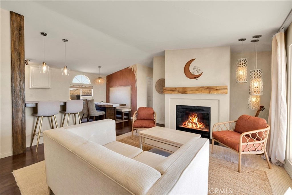 60707 Sonora Road Joshua Tree, CA 92252 - Photo 14 of 48 a living room with furniture and a fireplace
