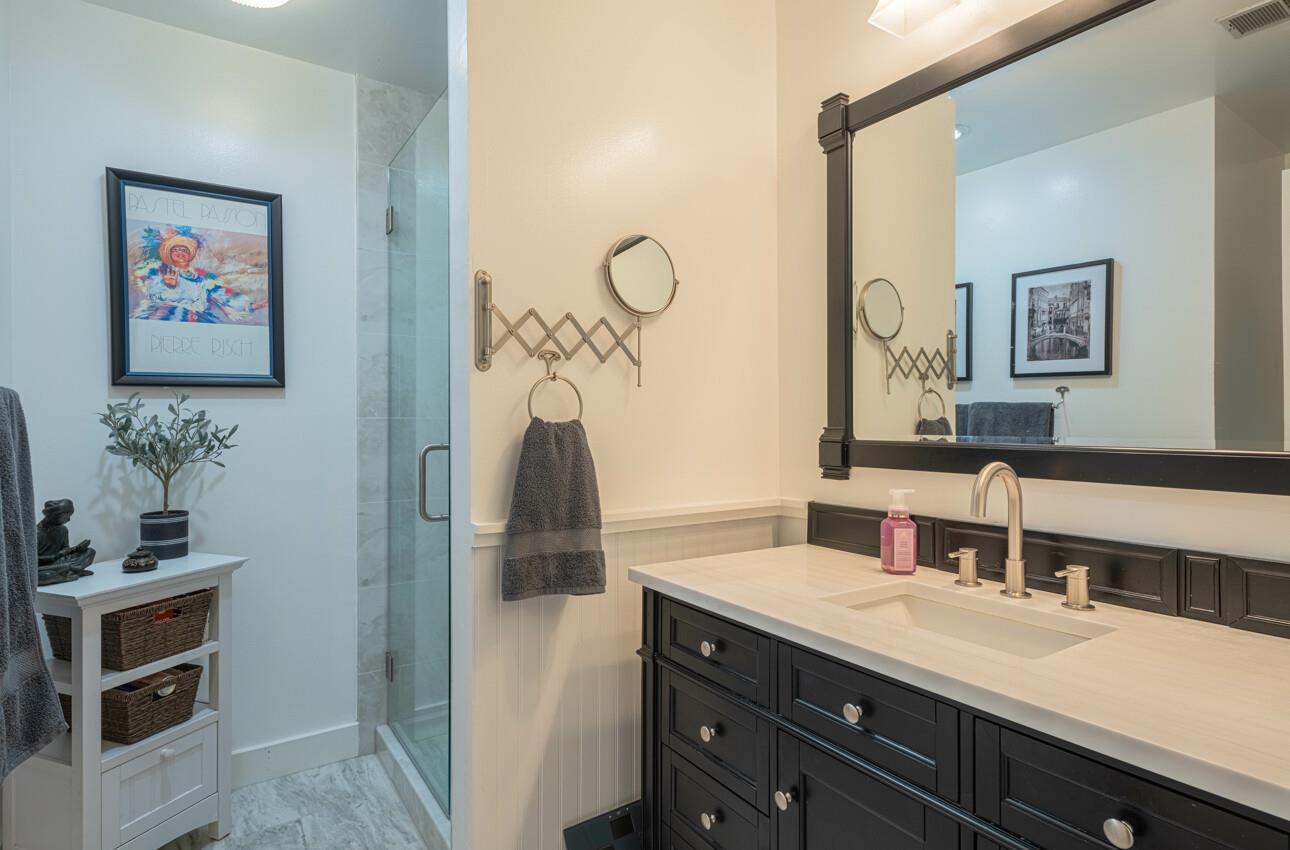 408 Kipling Street Salinas, CA 93901 - Photo 24 of 33 a bathroom with a sink and a mirror