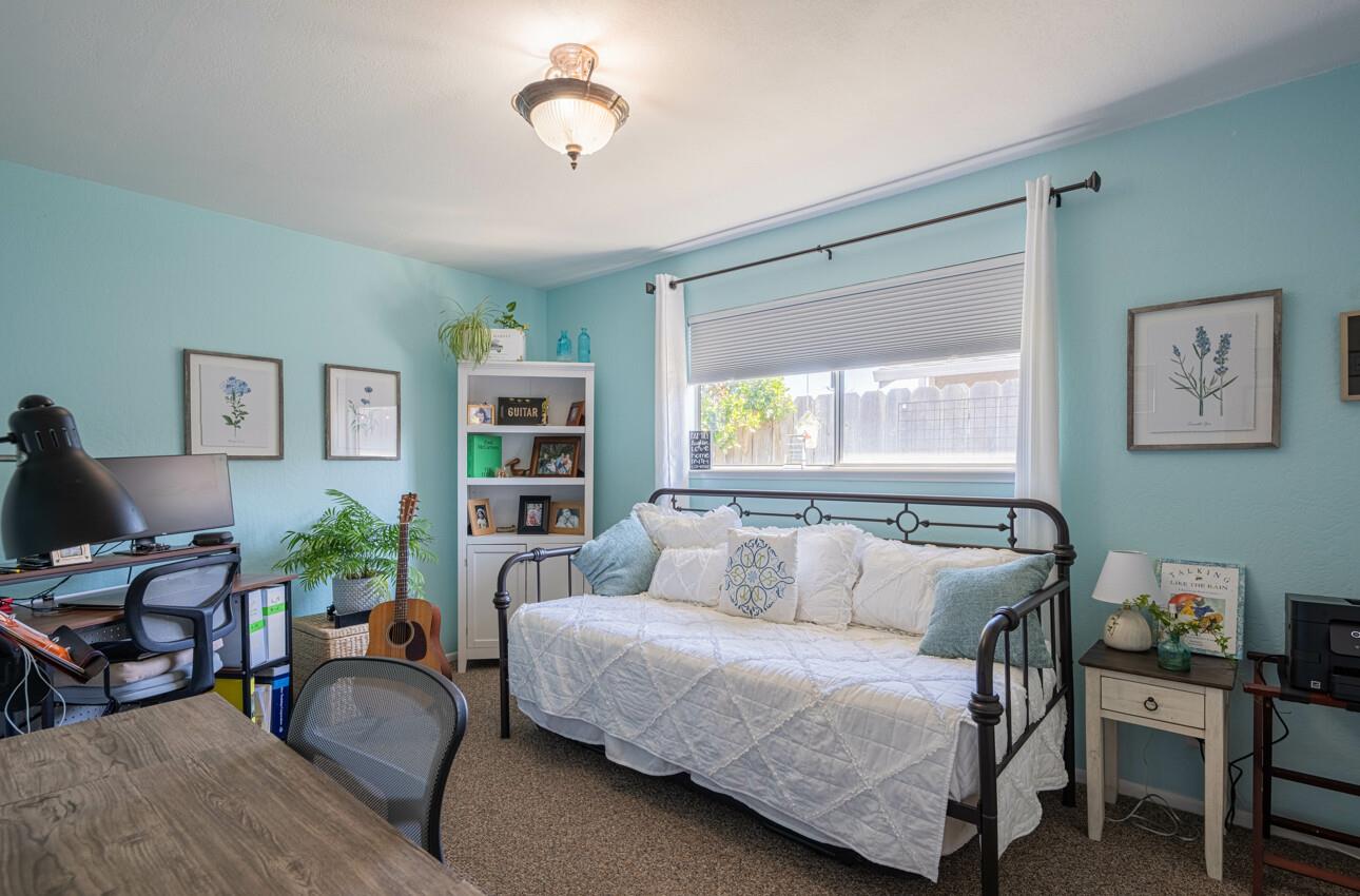 408 Kipling Street Salinas, CA 93901 - Photo 28 of 33 a bedroom with furniture and a window