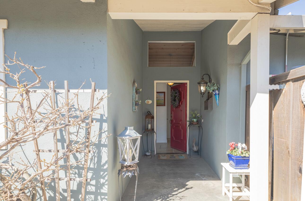 408 Kipling Street Salinas, CA 93901 - Photo 4 of 33 a living room with furniture and a chandelier
