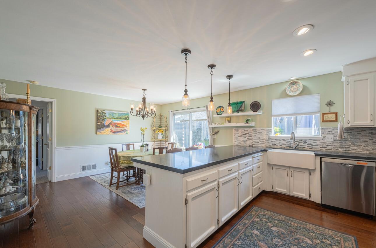 408 Kipling Street Salinas, CA 93901 - Photo 10 of 33 a kitchen with stainless steel appliances granite countertop a sink and cabinets