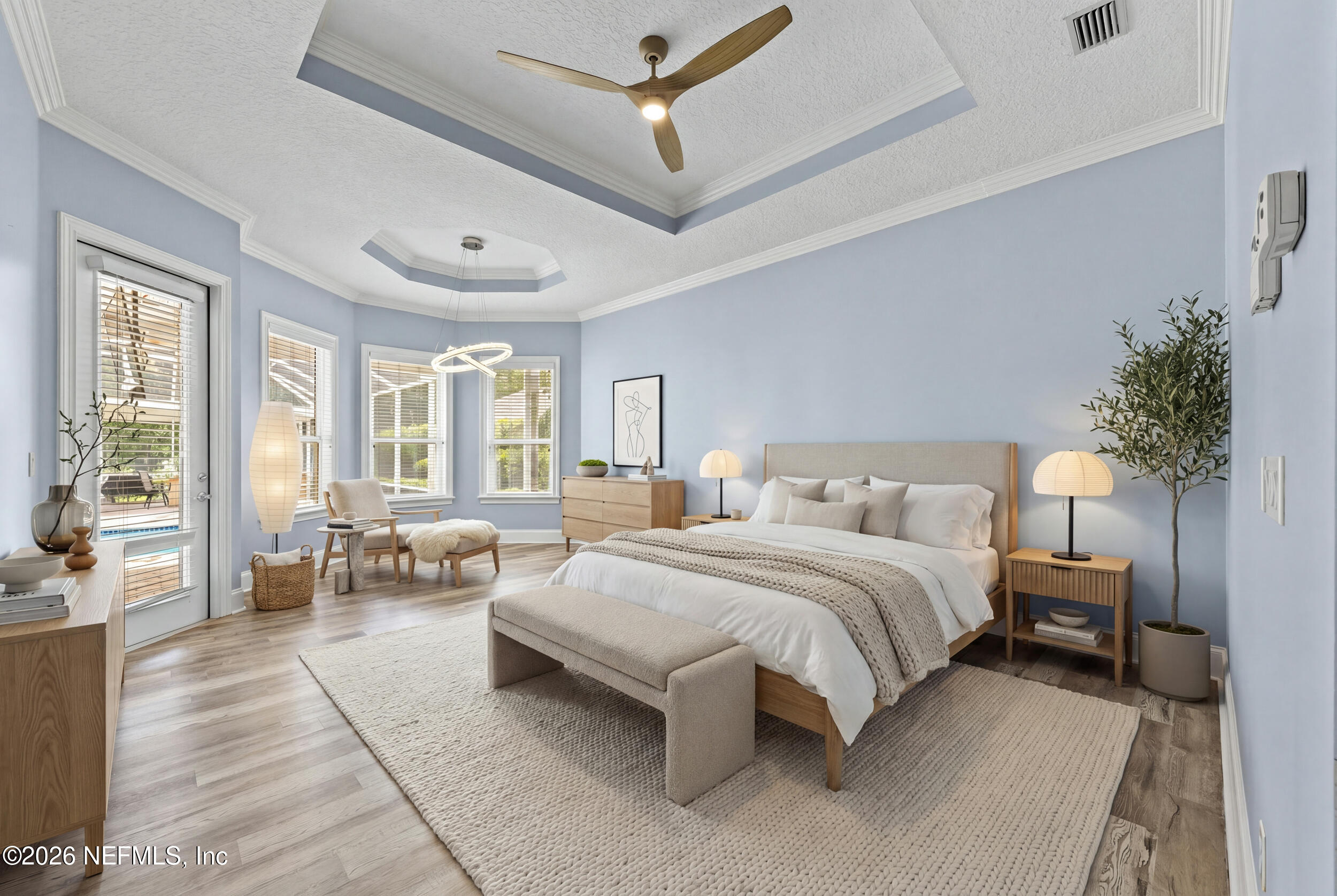 3225 Bishop Estates Road St. Johns, FL 32259 - Photo 23 of 90 a spacious bedroom with a bed and a couch