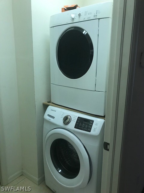 4063 Cherrybrook Loop Fort Myers, FL 33966 - Photo 12 of 15 a utility room with dryer and washer