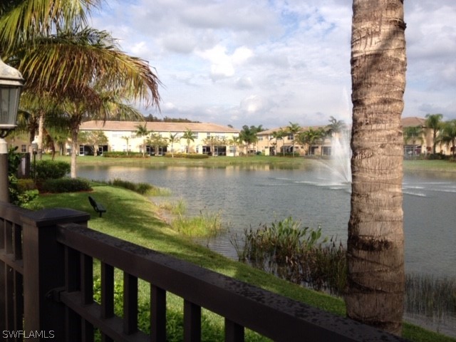 4063 Cherrybrook Loop Fort Myers, FL 33966 - Photo 13 of 15 a view of a lake from a balcony