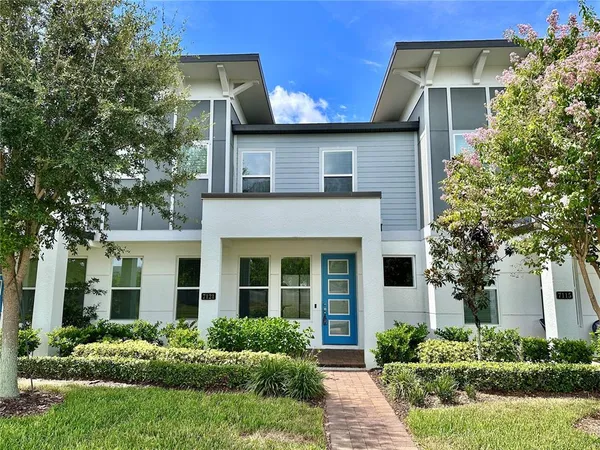 front view of a house with a yard
