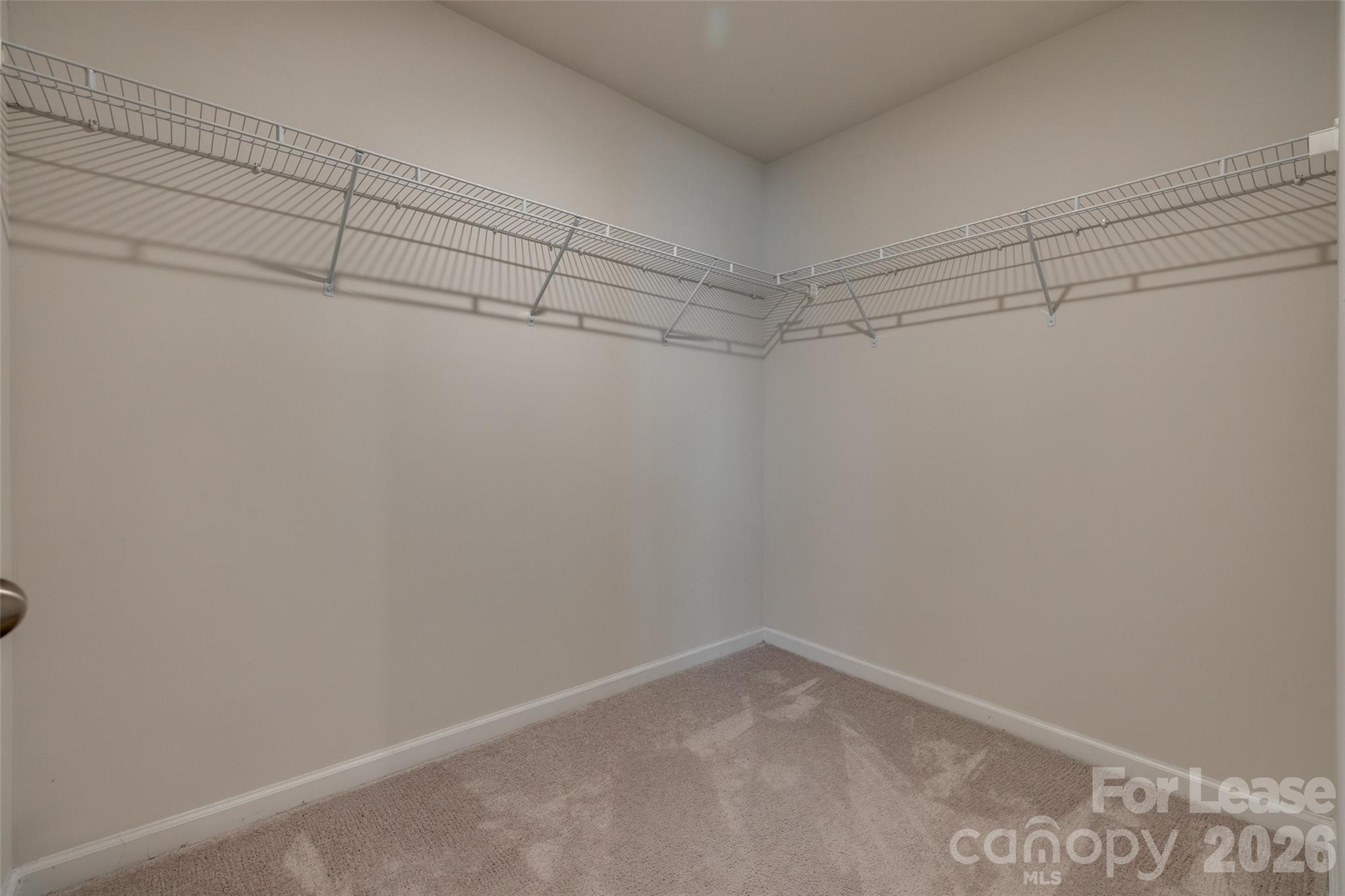 807 Gable Oak Lane Fort Mill, SC 29708 - Photo 23 of 39 a view of a room with racks on the wall