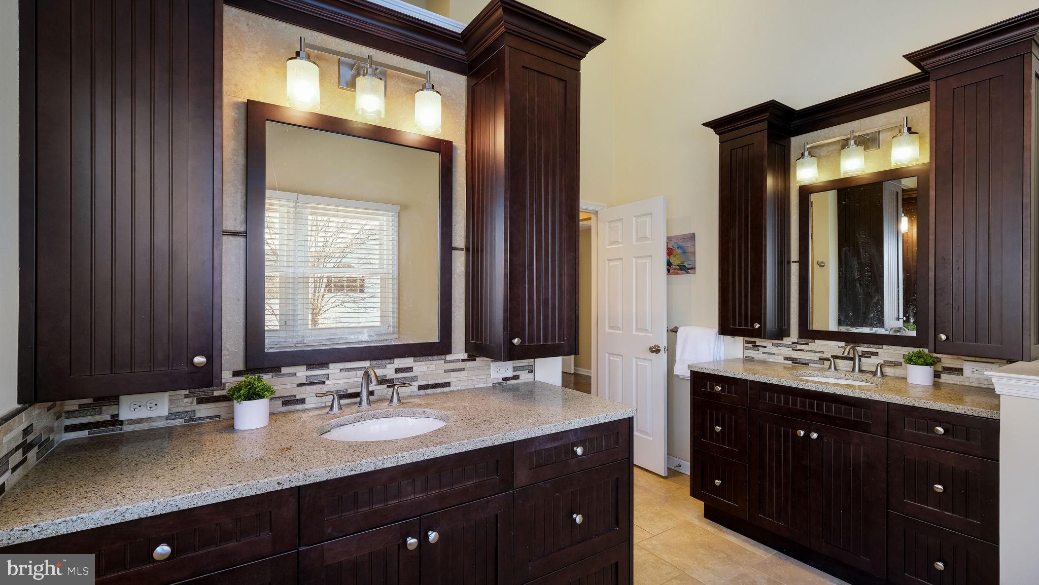 4 Bittersweet Drive Doylestown, PA 18901 - Photo 16 of 32 a bathroom with a double vanity sink and a mirror