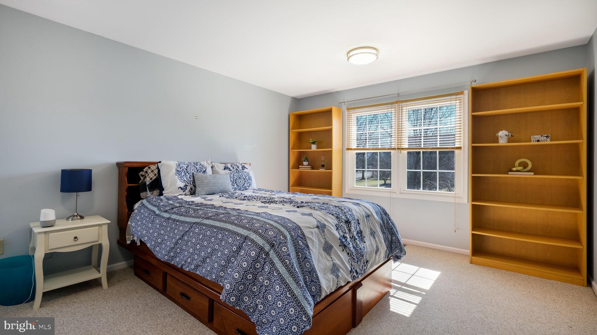 4 Bittersweet Drive Doylestown, PA 18901 - Photo 19 of 32 a bedroom with a bed and a window