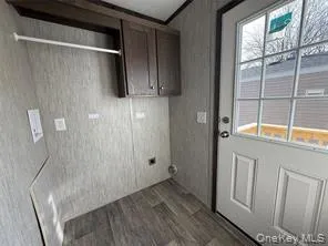a view of walk in closet with window