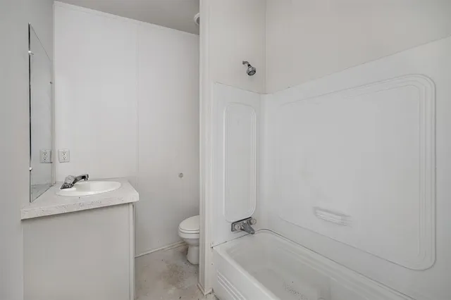 a bathroom with a sink and a toilet