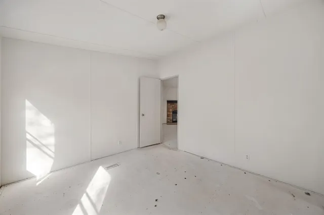 a view of a room that has a window in it