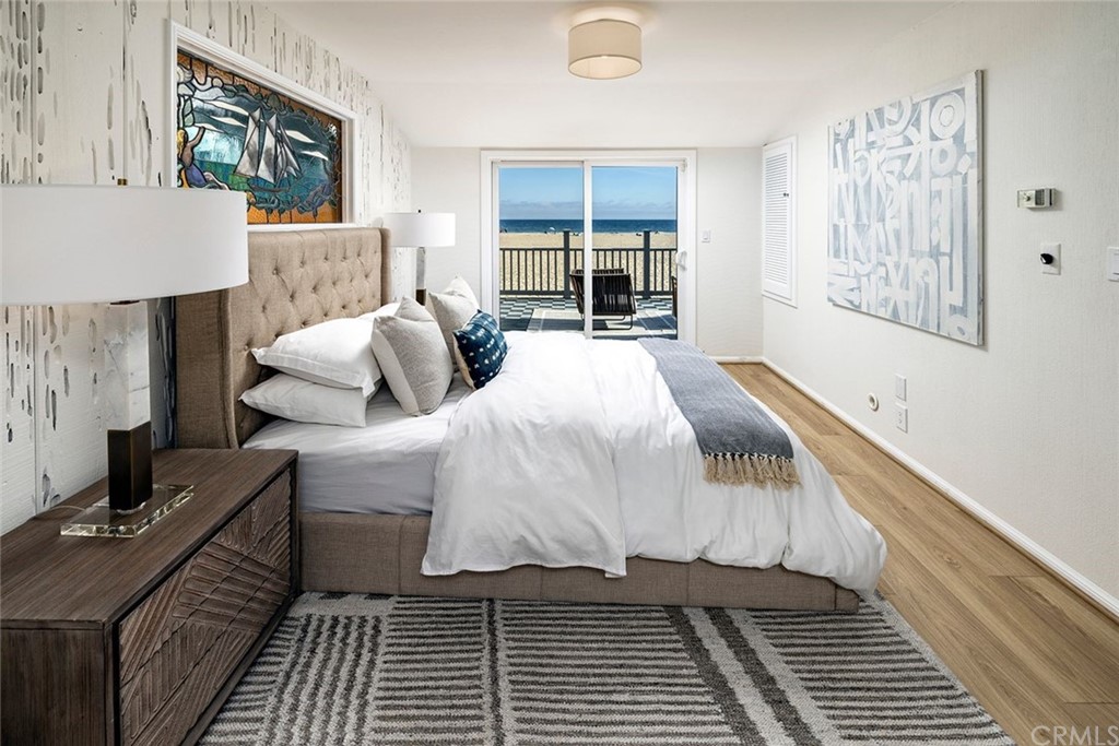 1708 West Oceanfront Newport Beach, CA 92663 - Photo 13 of 43 a bed room with a bed and a window
