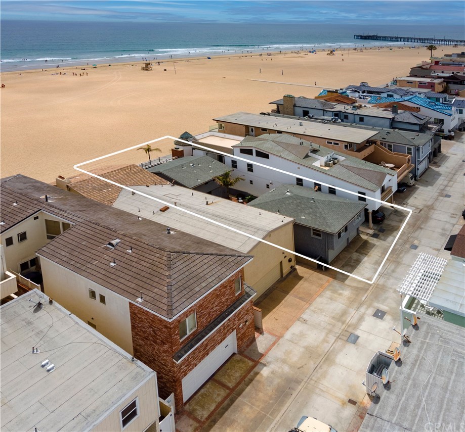 1708 West Oceanfront Newport Beach, CA 92663 - Photo 38 of 43 a view of a roof deck with an ocean view
