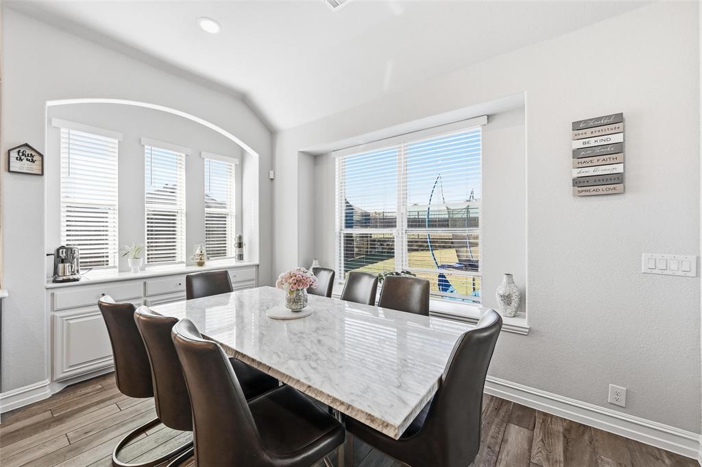 609 Dusty Glen Trail Midlothian, TX 76065 - Photo 12 of 40 a view of a dining room with furniture window and outside view