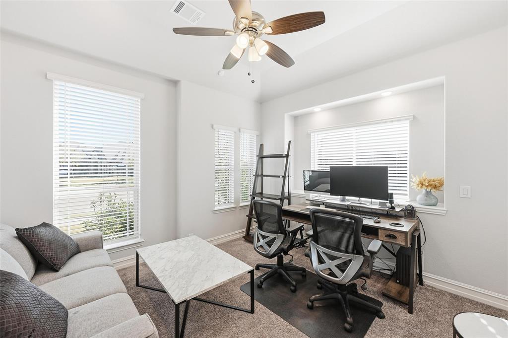 609 Dusty Glen Trail Midlothian, TX 76065 - Photo 14 of 40 a view of a workspace with a window and a ceiling fan