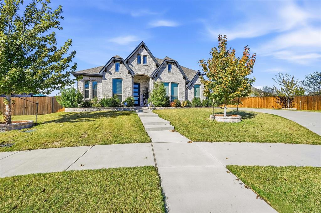 609 Dusty Glen Trail Midlothian, TX 76065 - Photo 39 of 40 a front view of a house with a yard