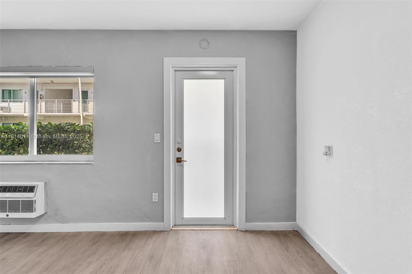9200 East Bay Harbor Drive, Unit 2A Bay Harbor Islands, FL 33154 - Photo 29 of 45 a view of an empty room with a window