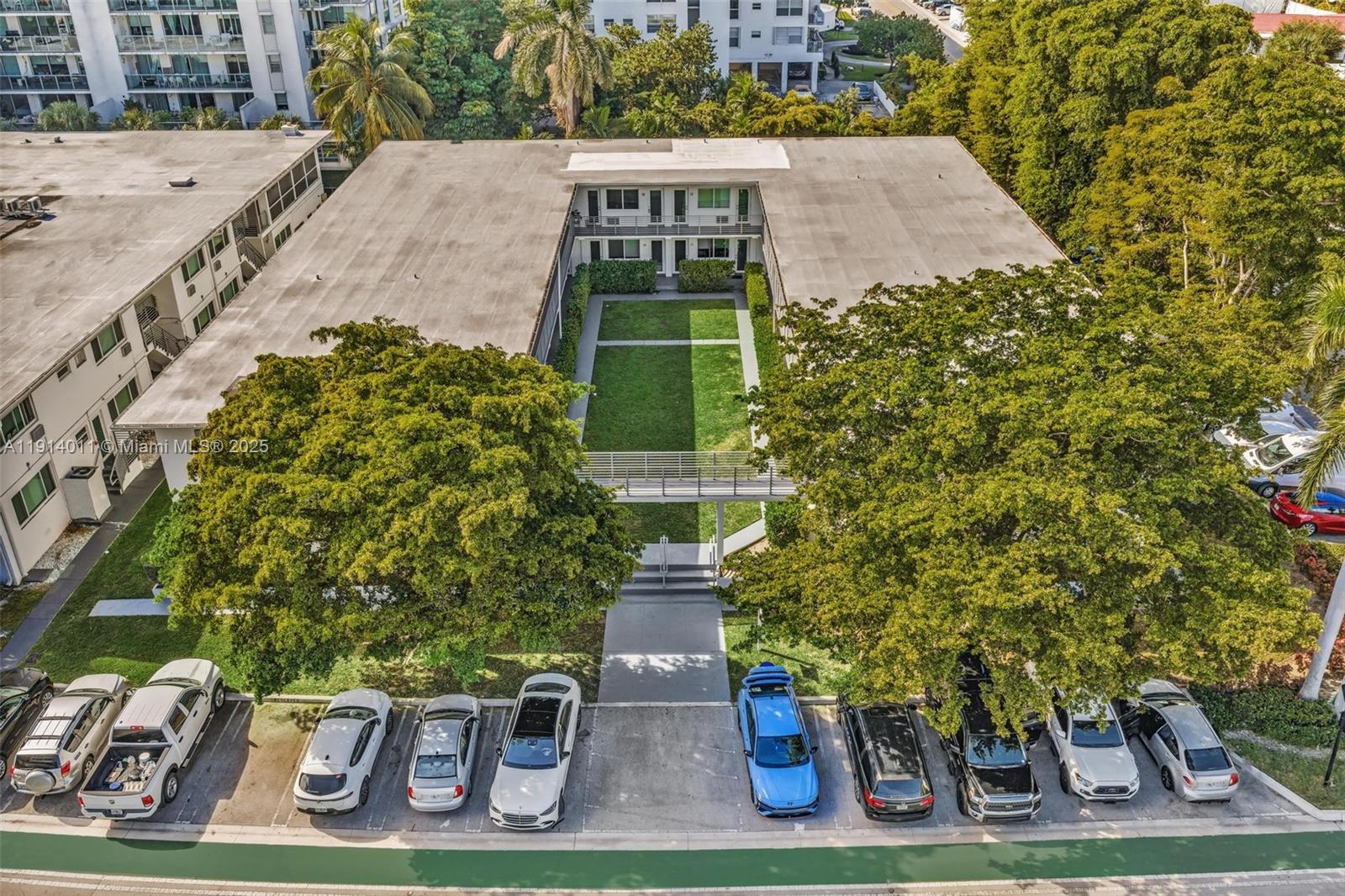 9200 East Bay Harbor Drive, Unit 2A Bay Harbor Islands, FL 33154 - Photo 33 of 45 a front view of a house with garden