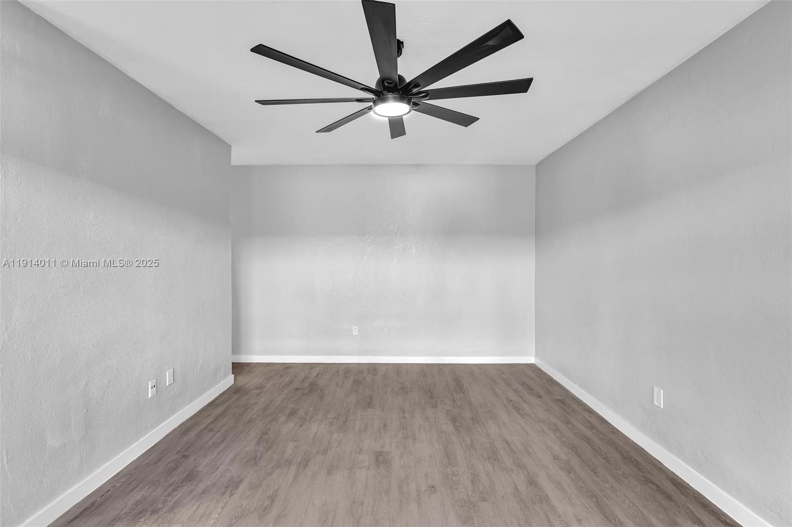 9200 East Bay Harbor Drive, Unit 2A Bay Harbor Islands, FL 33154 - Photo 9 of 45 wooden floor in an empty room