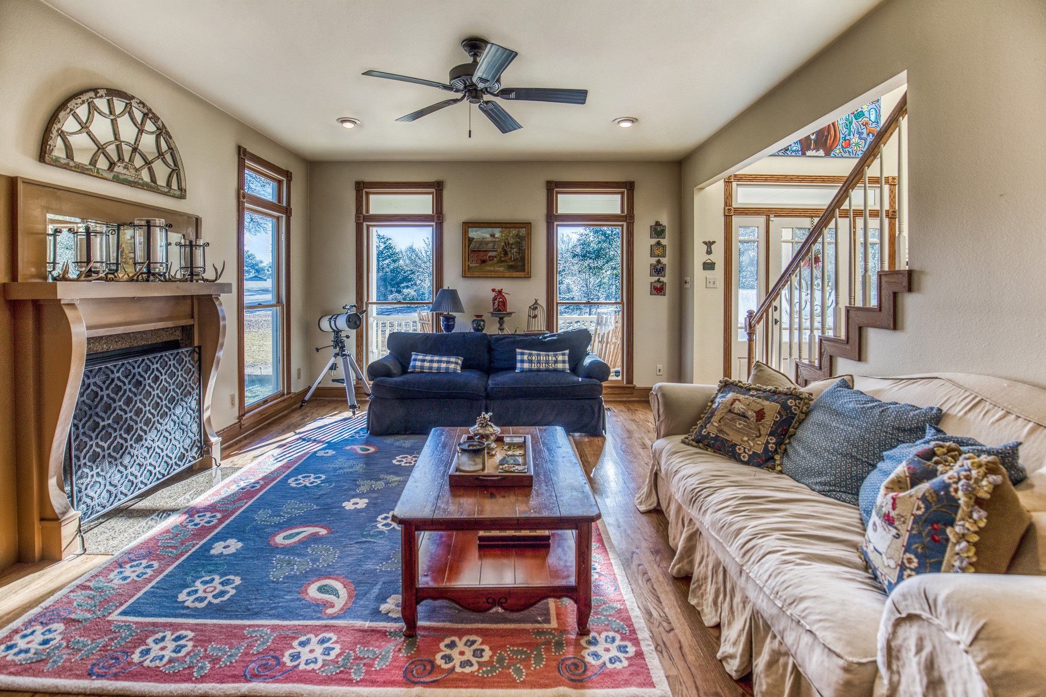 533 Bybee Road Round Top, TX 78954 - Photo 2 of 29 a living room with furniture floor to ceiling window and a rug