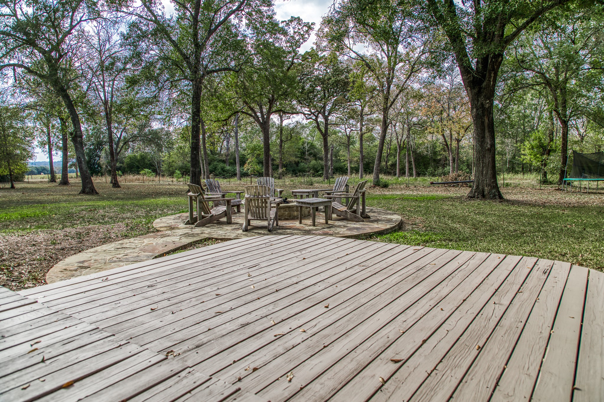 533 Bybee Road Round Top, TX 78954 - Photo 22 of 29 a view of a park with wooden bench and trees