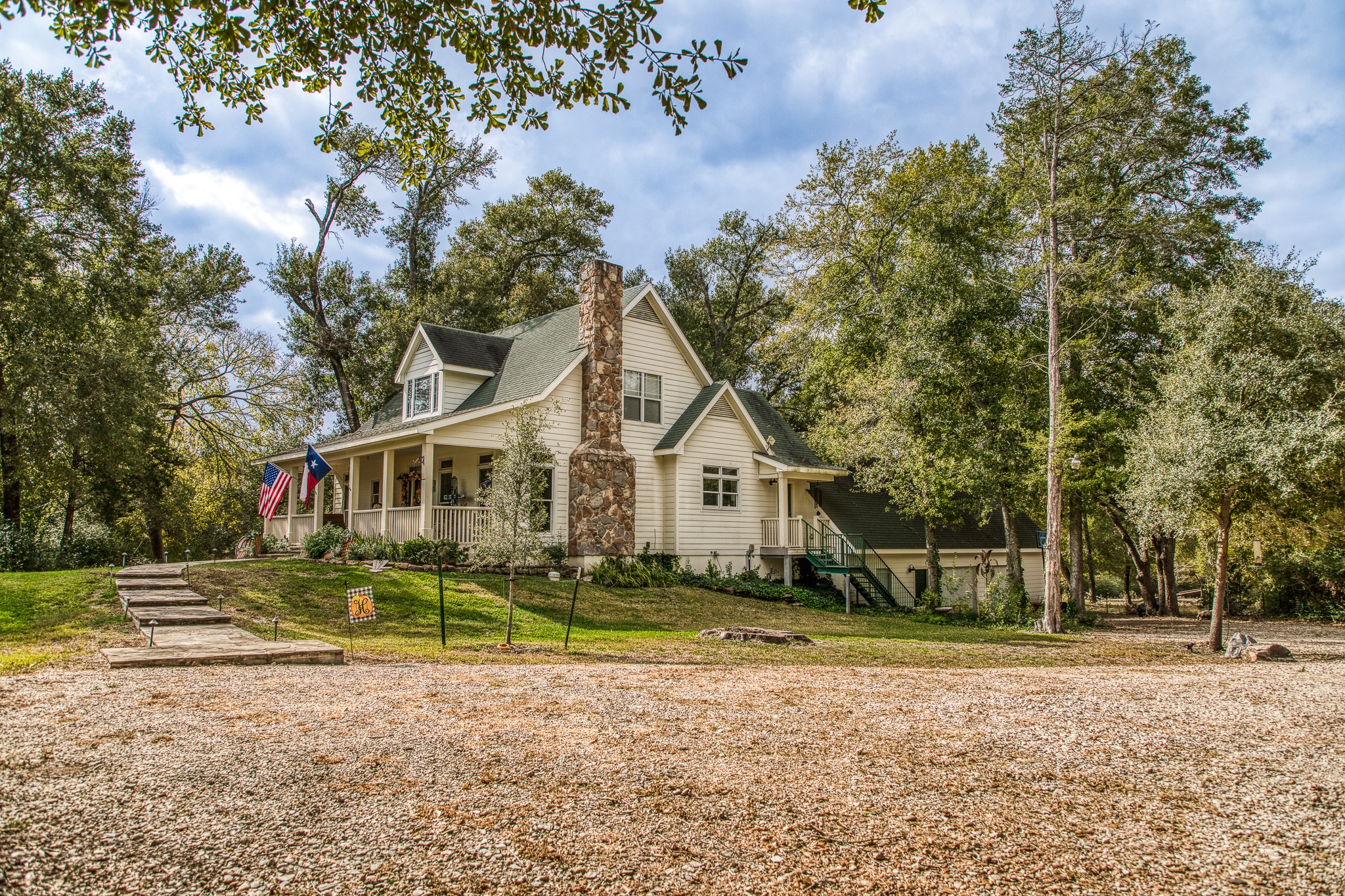 533 Bybee Road Round Top, TX 78954 - Photo 25 of 29 a front view of a house with a yard
