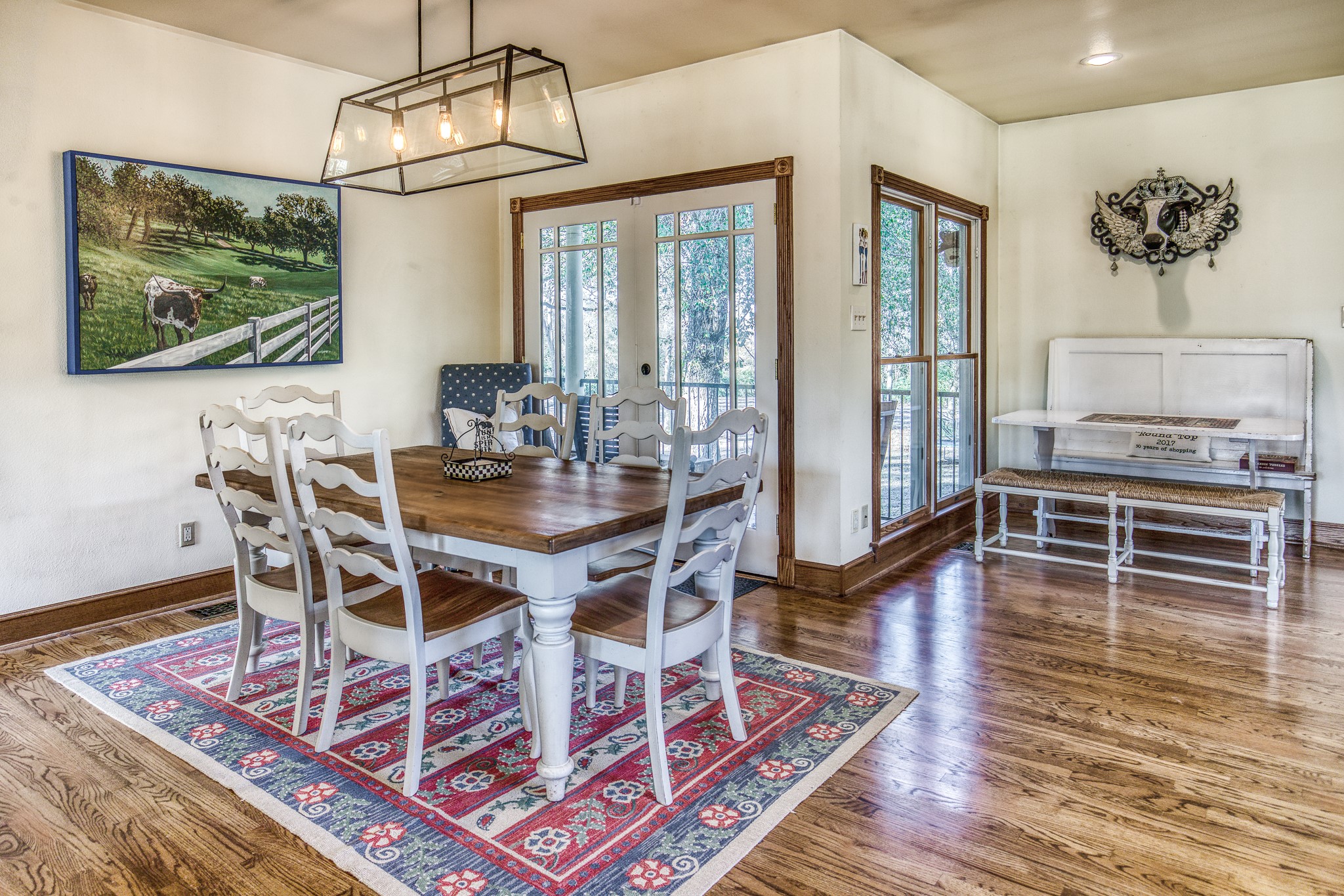 533 Bybee Road Round Top, TX 78954 - Photo 6 of 29 a view of a dining room with furniture window and wooden floor