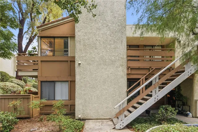 a front view of a house with windows