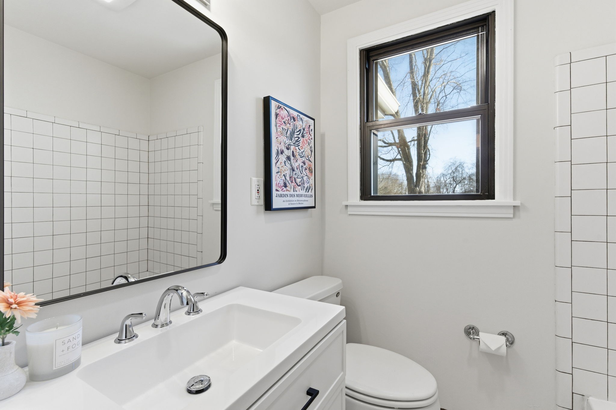 434 Adair Road Nashville, TN 37214 - Photo 13 of 25 a bathroom with a sink mirror and a toilet