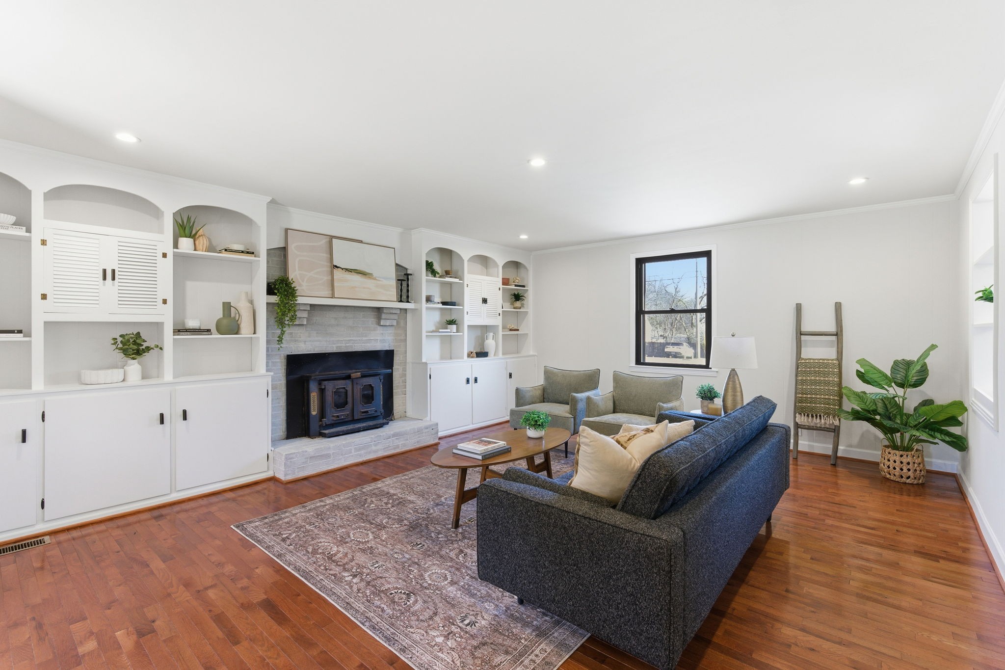 434 Adair Road Nashville, TN 37214 - Photo 3 of 25 a living room with furniture and a fireplace
