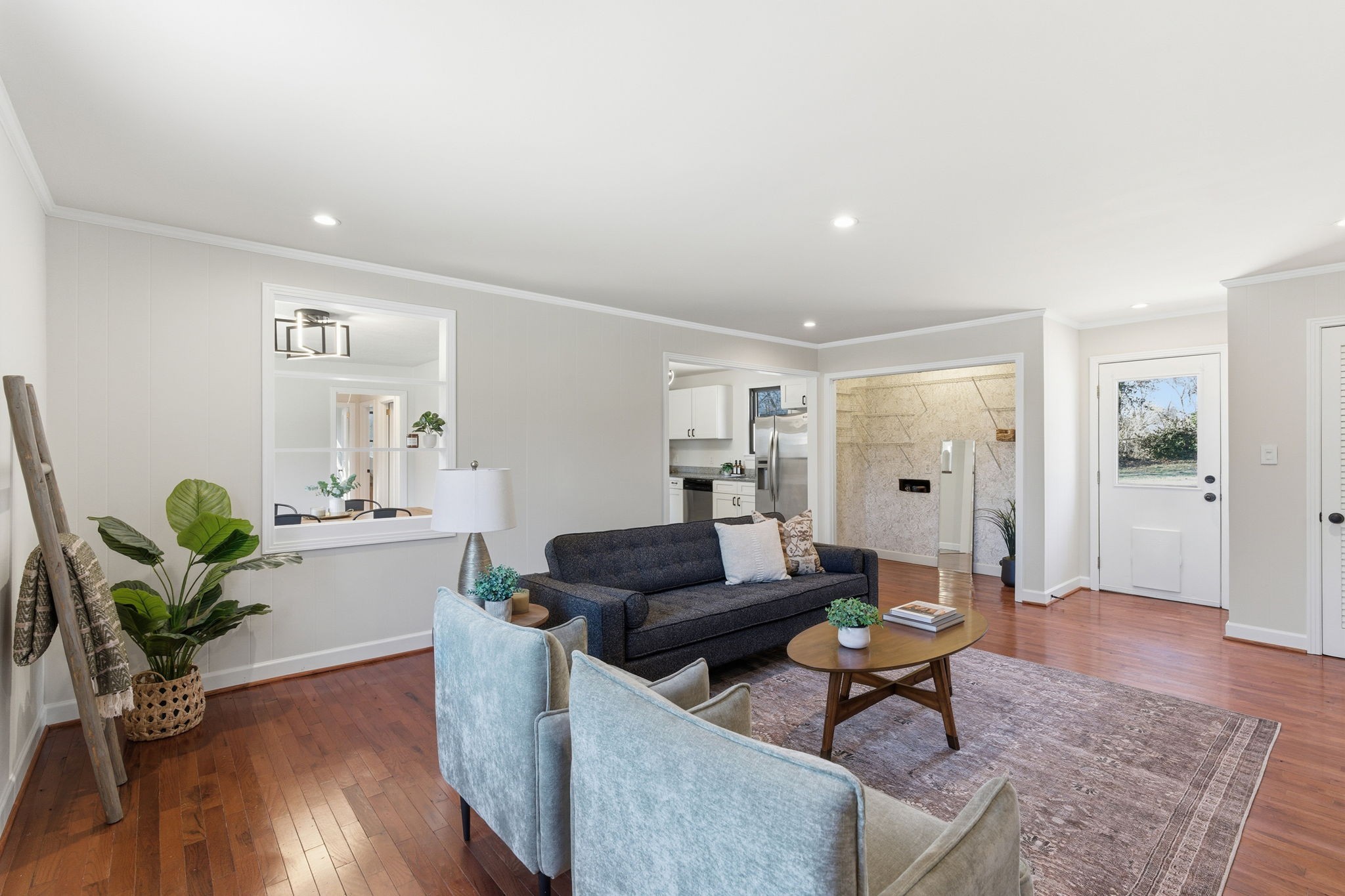 434 Adair Road Nashville, TN 37214 - Photo 6 of 25 a living room with furniture potted plant and wooden floor