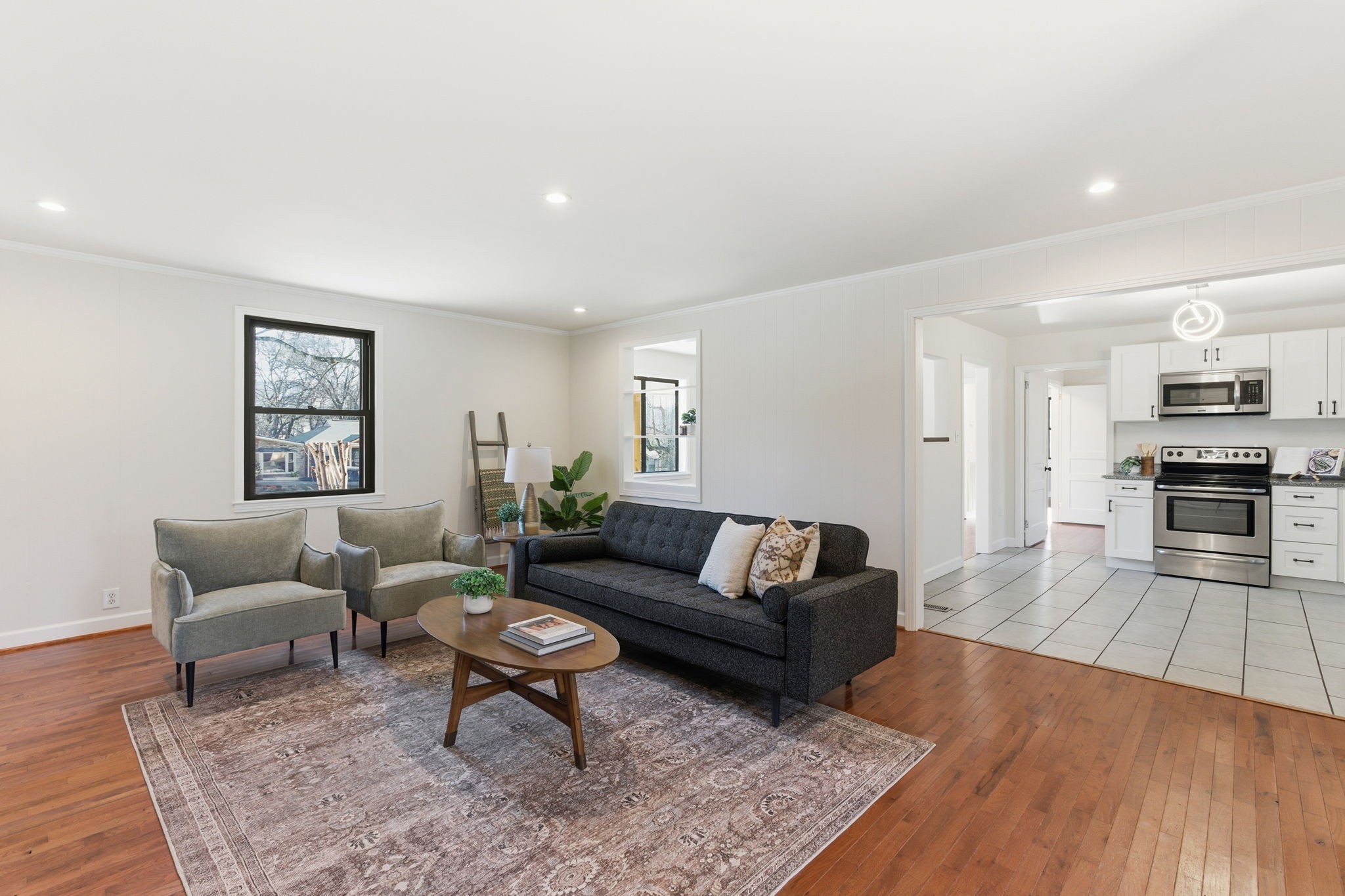 434 Adair Road Nashville, TN 37214 - Photo 7 of 25 a living room with furniture and a wooden floor