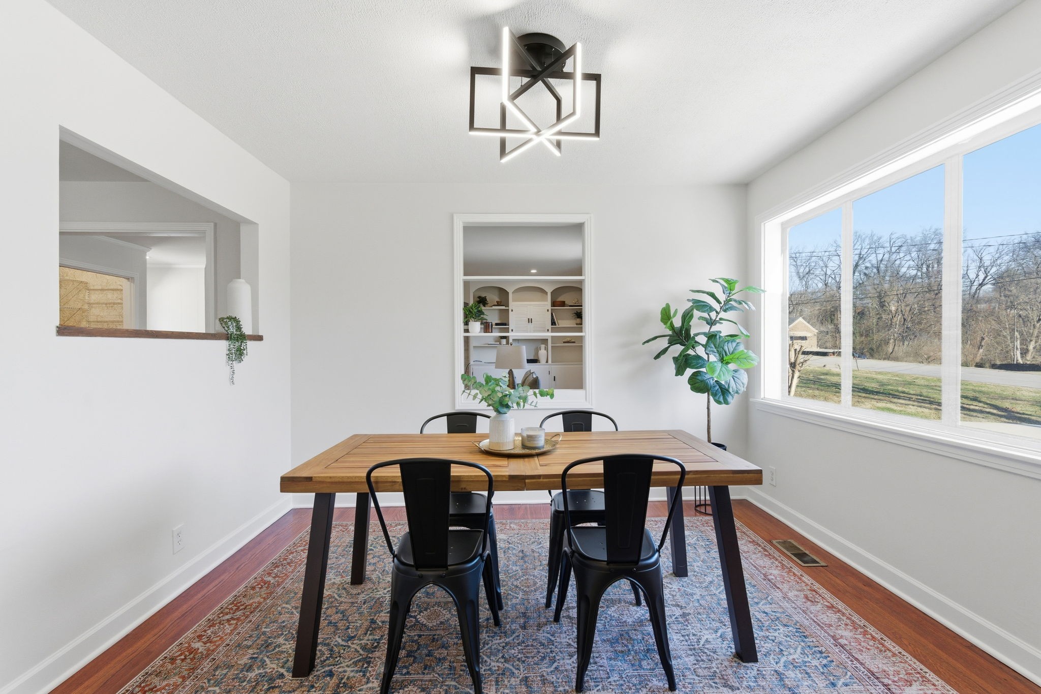 434 Adair Road Nashville, TN 37214 - Photo 9 of 25 a view of a dining room with furniture window and wooden floor