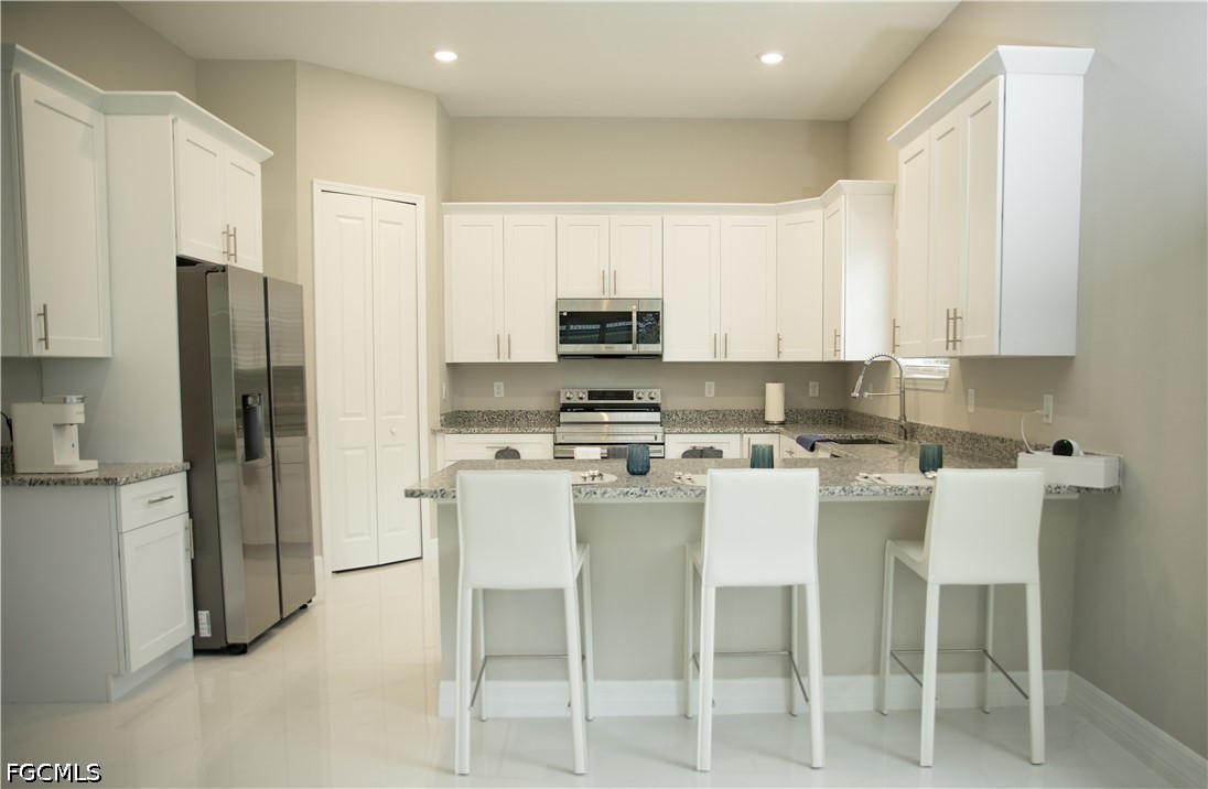 1226 Chrisholm Street Lehigh Acres, FL 33974 - Photo 4 of 17
