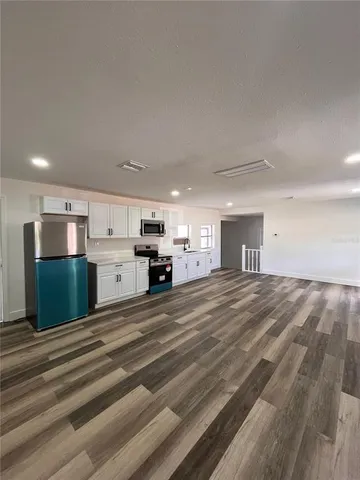 a view of kitchen and kitchen island
