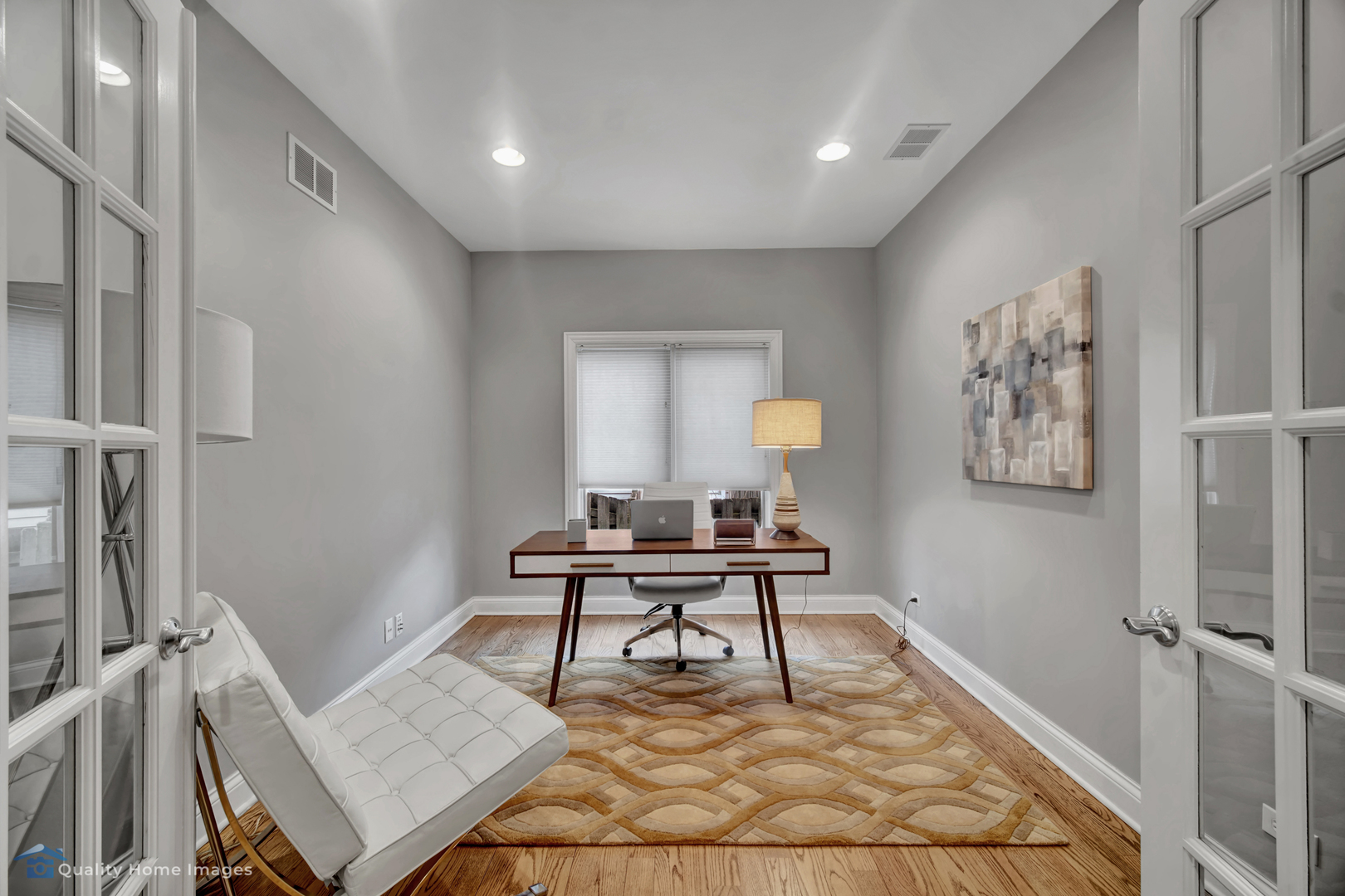 1323 Kenton Road Deerfield, IL 60015 - Photo 14 of 20 a living room with furniture a rug and a table