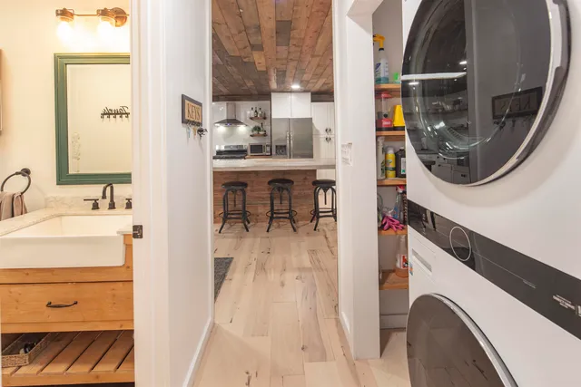 a view of living room with washer and dryer
