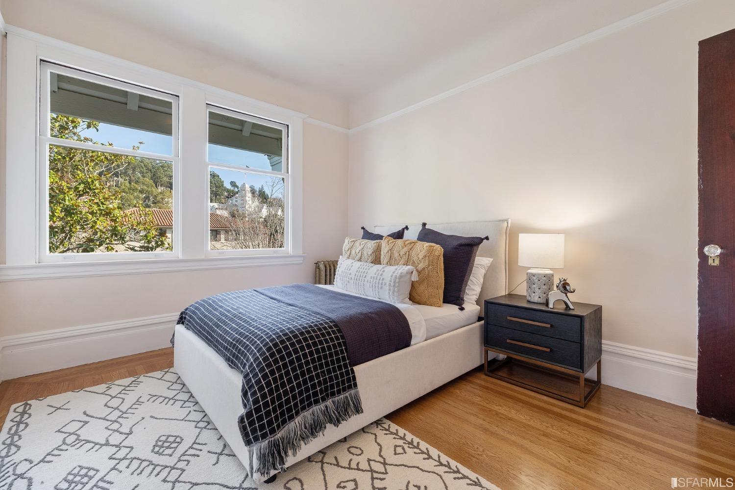 2967 Avalon Avenue Berkeley, CA 94705 - Photo 46 of 77 a bedroom with a bed and a window